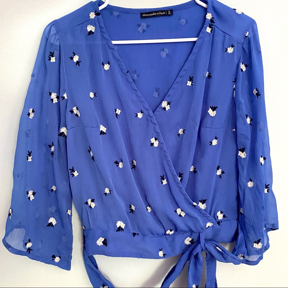 Wrap blouse with yellow flower embroidery